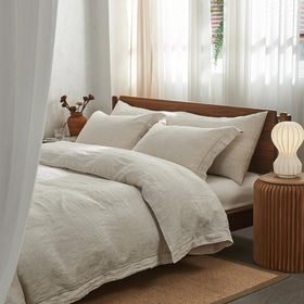 Simple&Opulence farmhouse-style bedroom setup with natural linen bedding for timeless charm.
