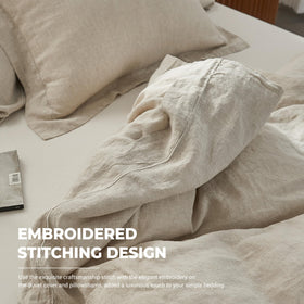 Simple&Opulence embroidered pillowshams detail enhances coordinated bedding set.
