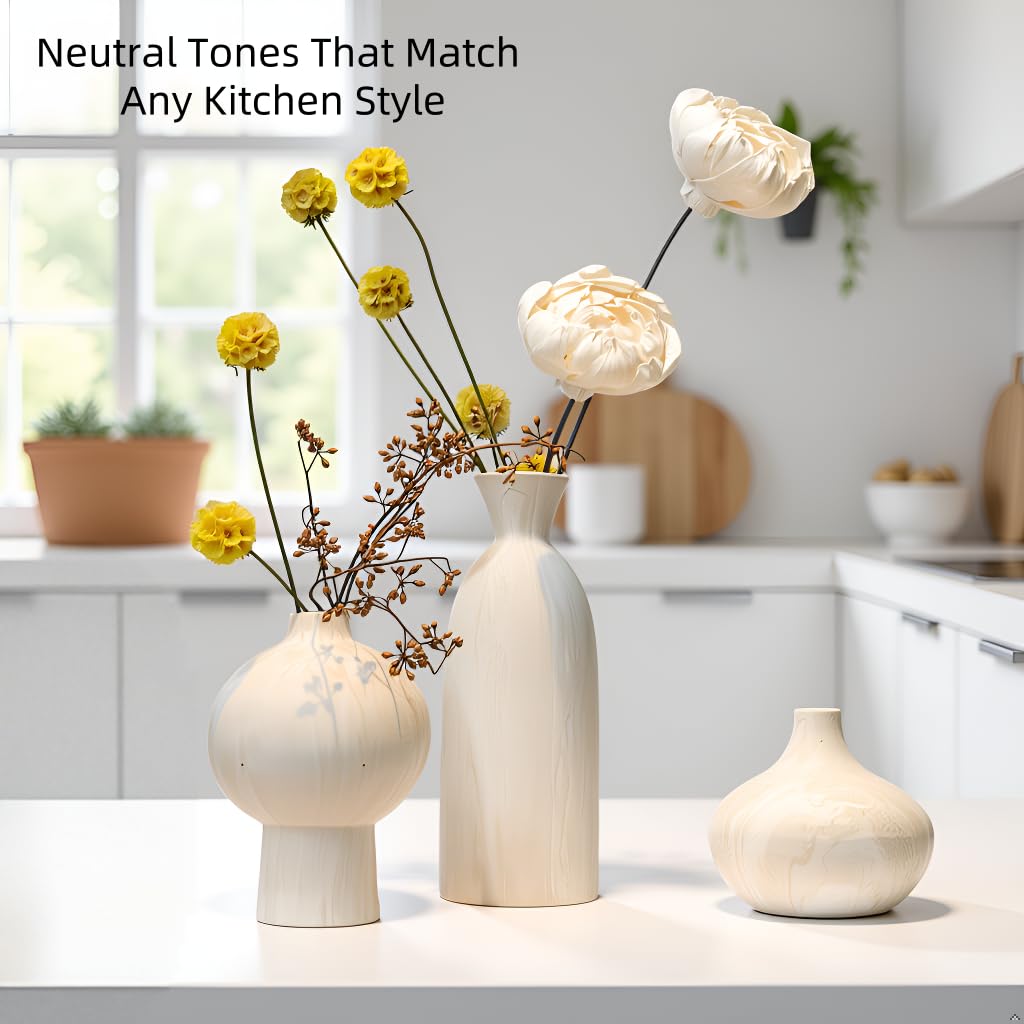 SincereLuxe three-vase set with faux stems on a coffee table.