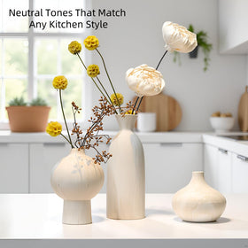 SincereLuxe three-vase set with faux stems on a coffee table.
