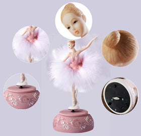 Rotating dancer base powers a classical tune, creating a serene recital ambiance.