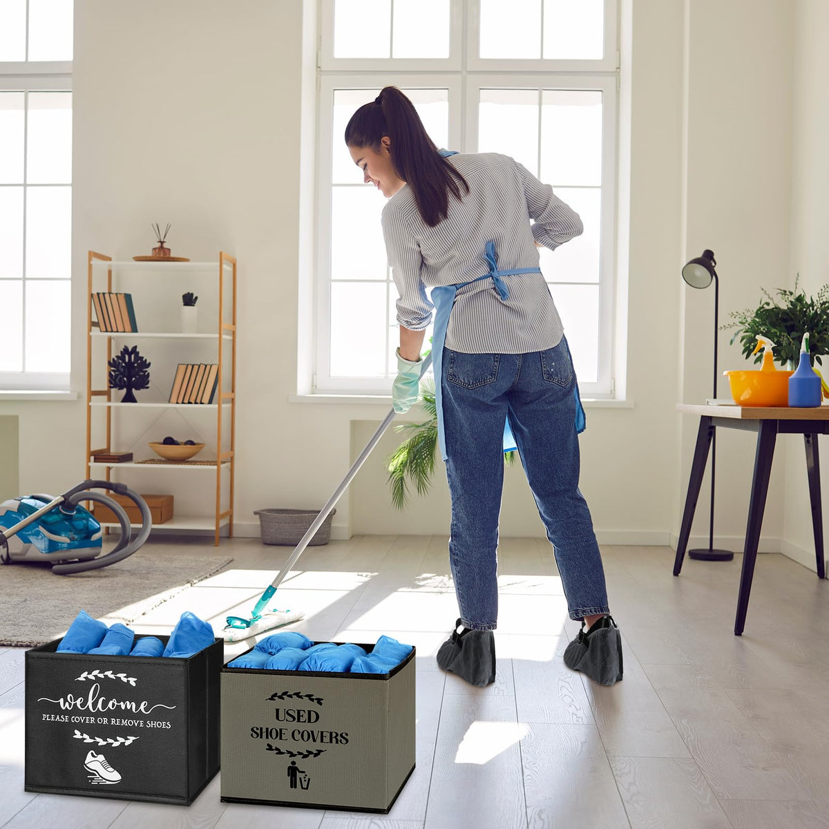 Singhoow open house setup shows two bins aiding guest etiquette.