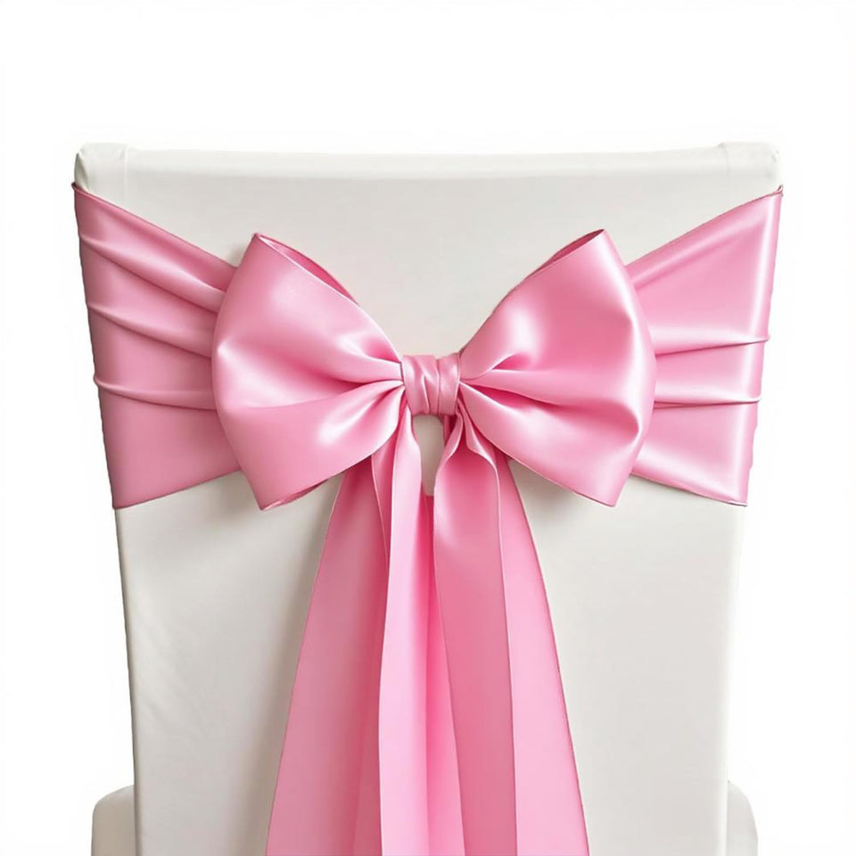 SINSSOWL pink satin chair sash on wedding setup adds elegant color.