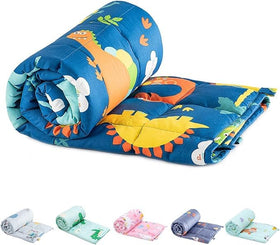 Sivio weighted blanket on bed with blue dinosaur print for calming comfort.