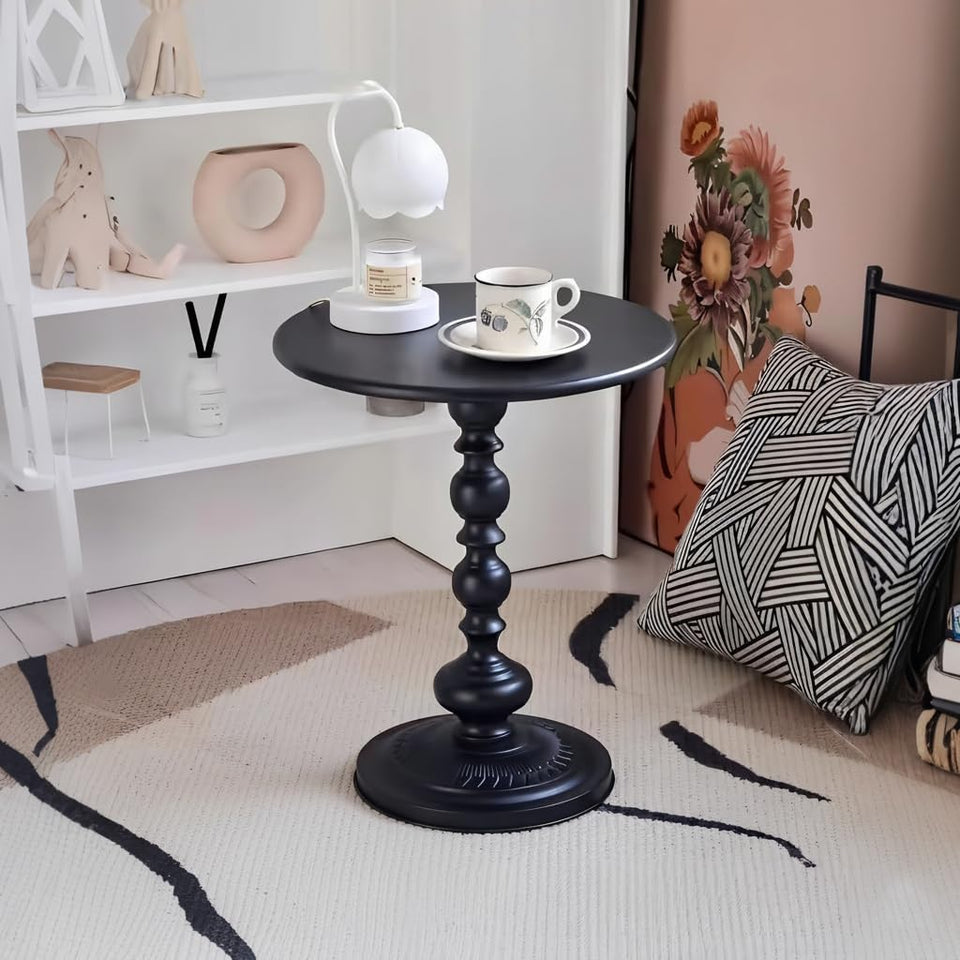 SJIE round-top side table beside a sofa for drinks and lamps