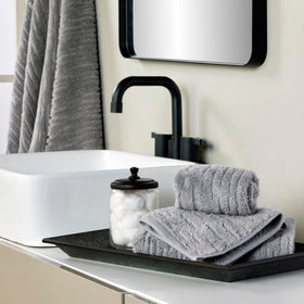 SKL Home CloudSoft hand towel gray demonstrates absorbent, quick-dry fabric for daily use