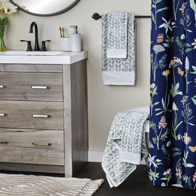 SKL Home Distressed Leaves hand towel is machine washable for easy care