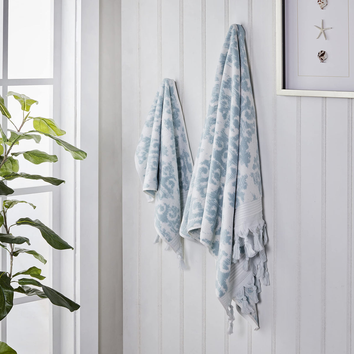 Mirage Fringe towel set in bathroom showcasing reversible colors