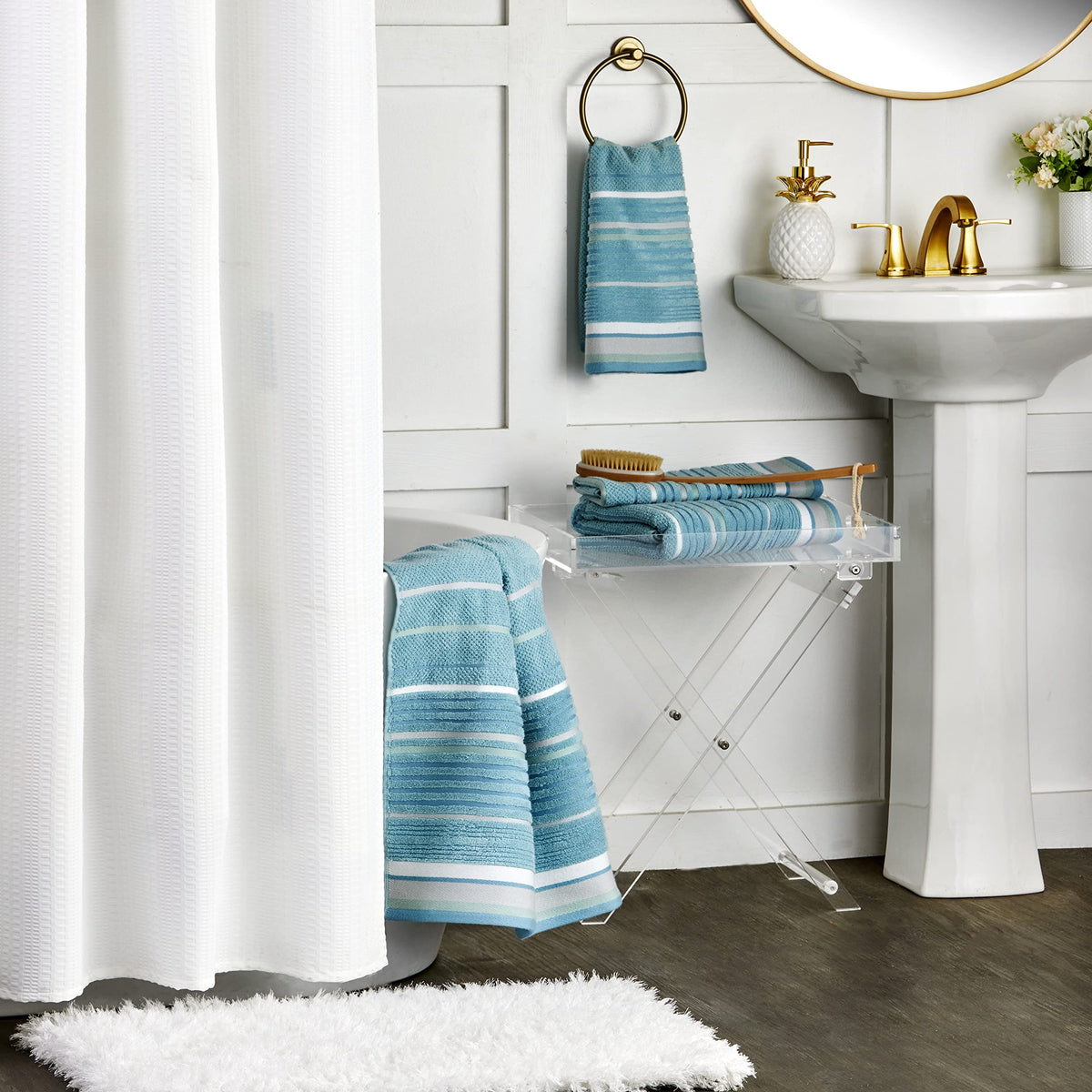 Calm bathroom setup featuring SKL Home Seabrook Stripe towel