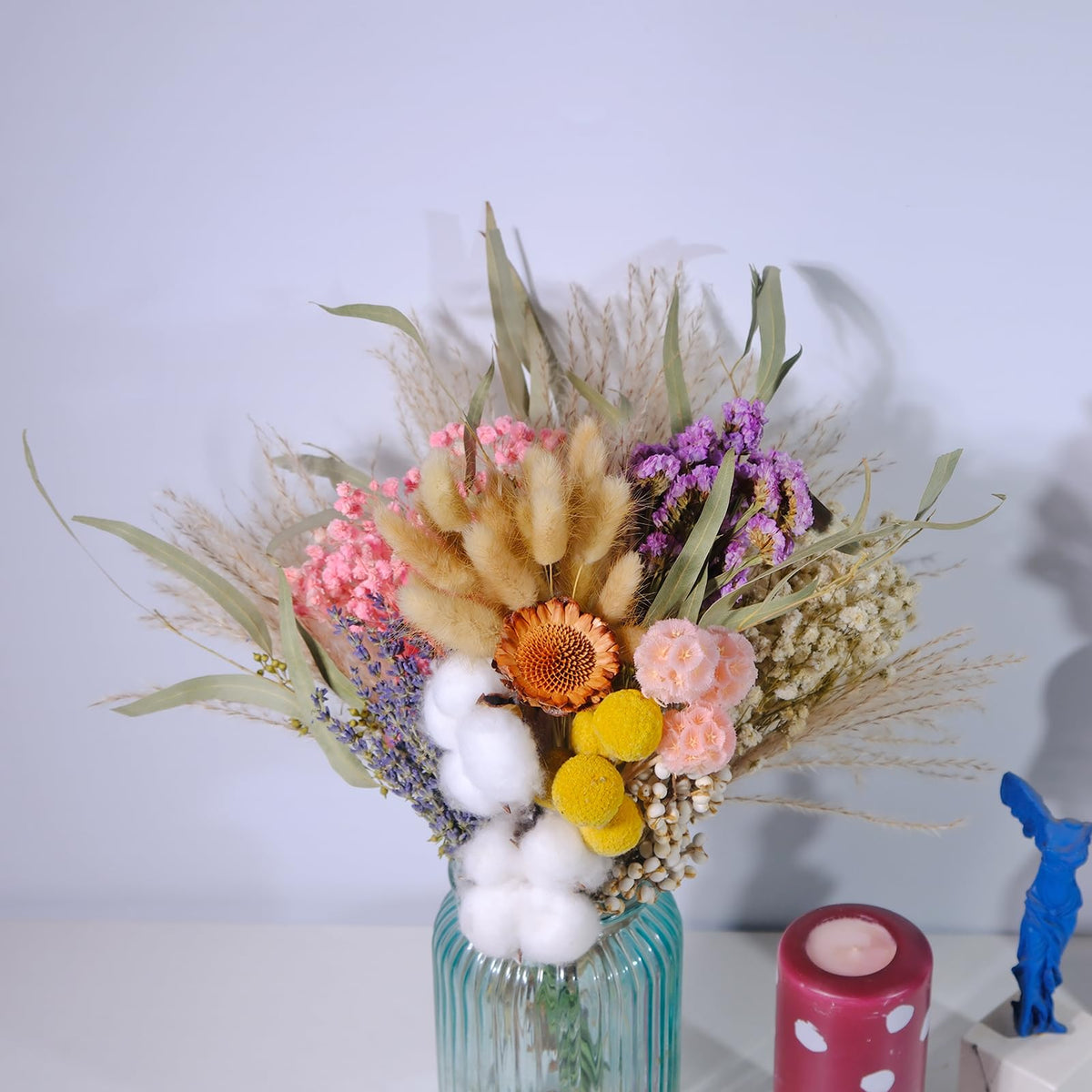 SKOGSKUNST flexible stems 8-13 inches for easy container customization.