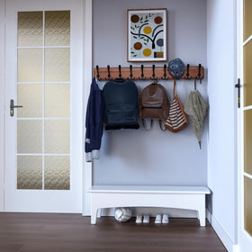 SKOLOO aluminum hook assembly on solid wood base for durable hanging.