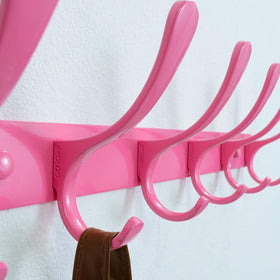 SKOLOO coat rack in an entryway with hardware included for easy installation.