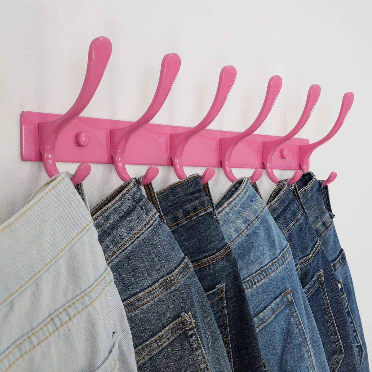 SKOLOO coat rack features wider spaced, curved ends to protect belongings.
