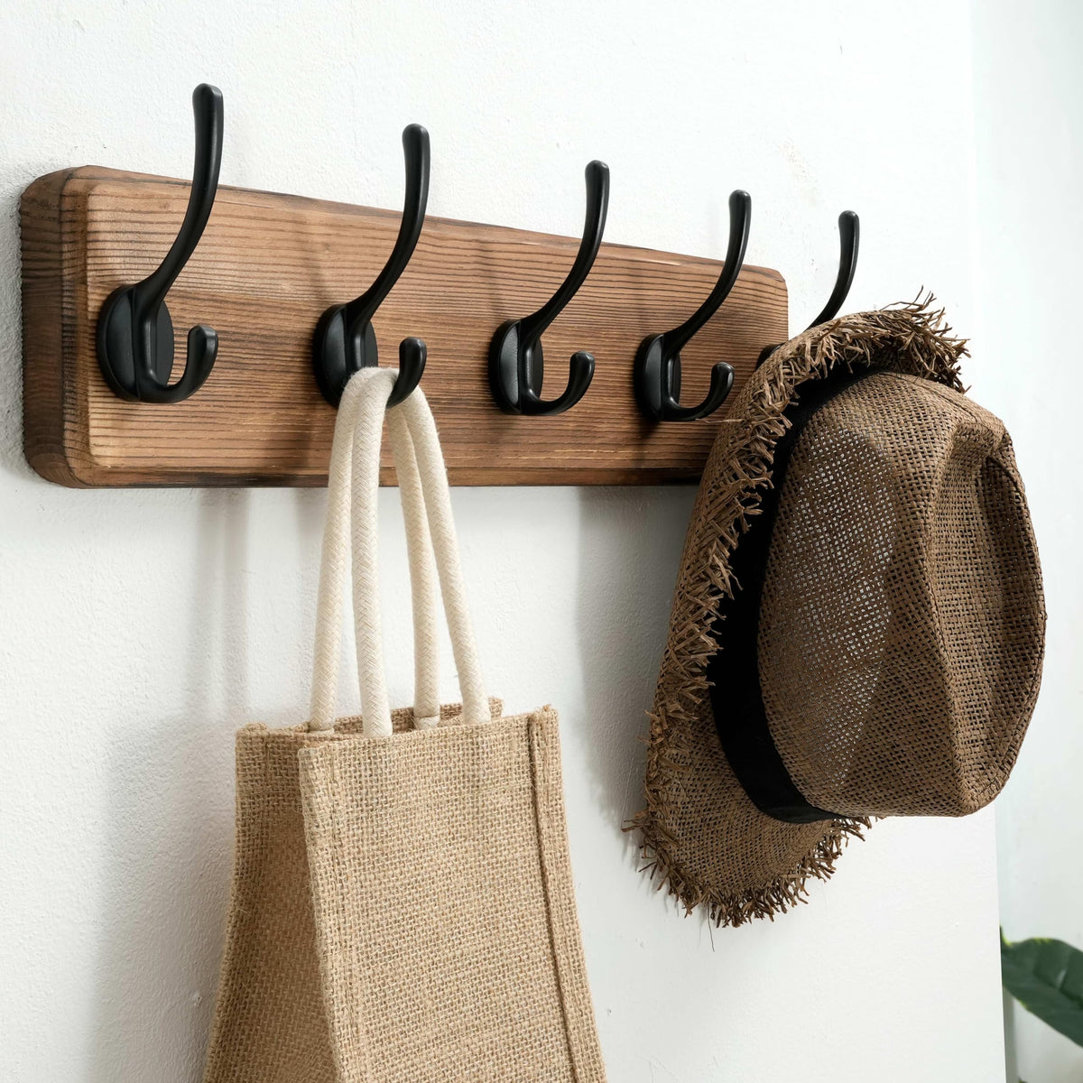 SKOLOO entryway-friendly wall-mount rack keeps coats organized.