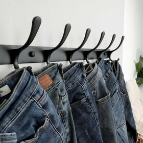 SKOLOO coat rack shows wider spacing and curved ends protecting belongings.