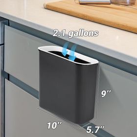 Skyflame trash bin with adhesive hooks hanging beside cabinet for flexible placement.