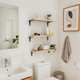 Space-saving SKYSEN wall shelves maximize vertical room in small spaces