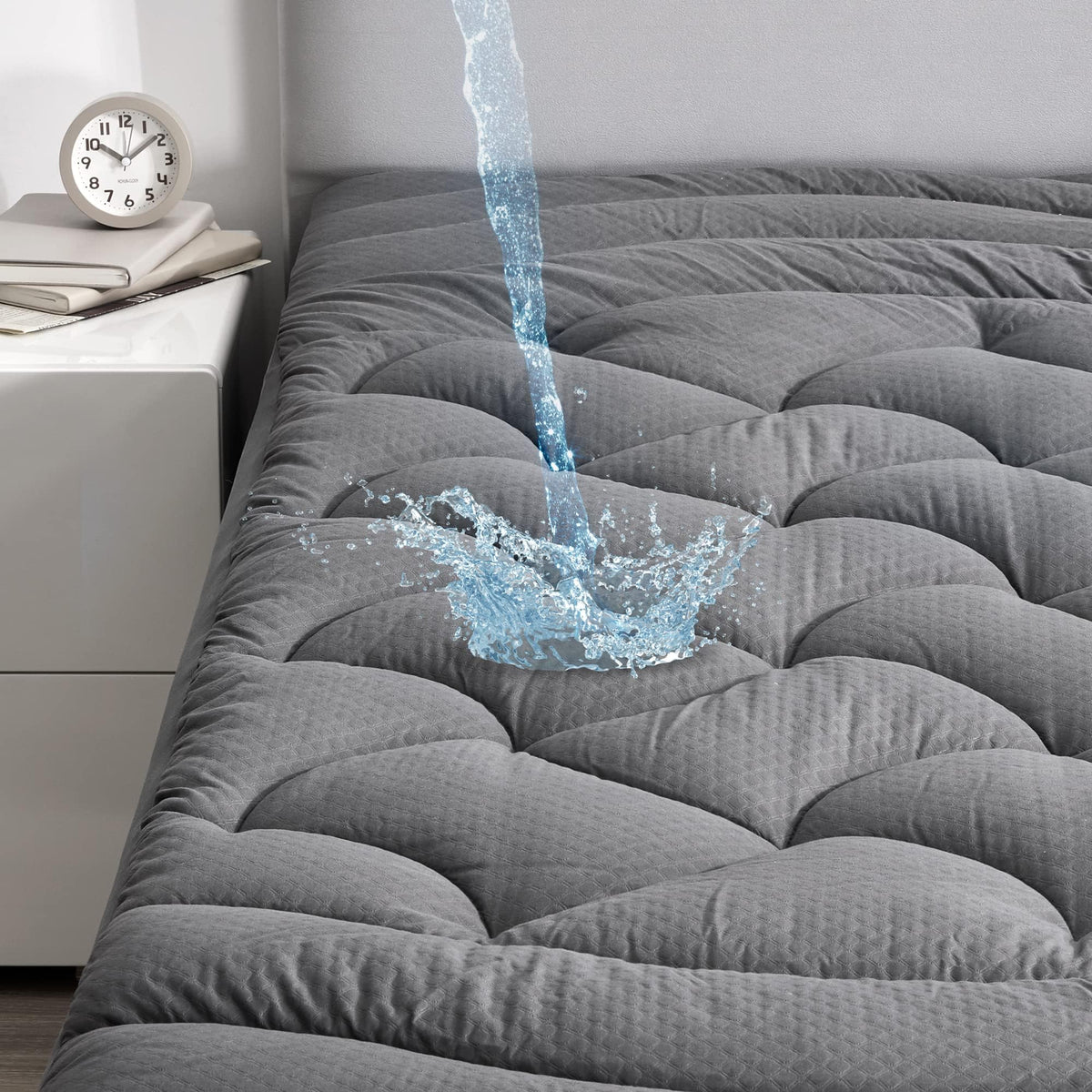 SLEEP ZONE grey waterproof mattress pad with full-topper protects against spills.