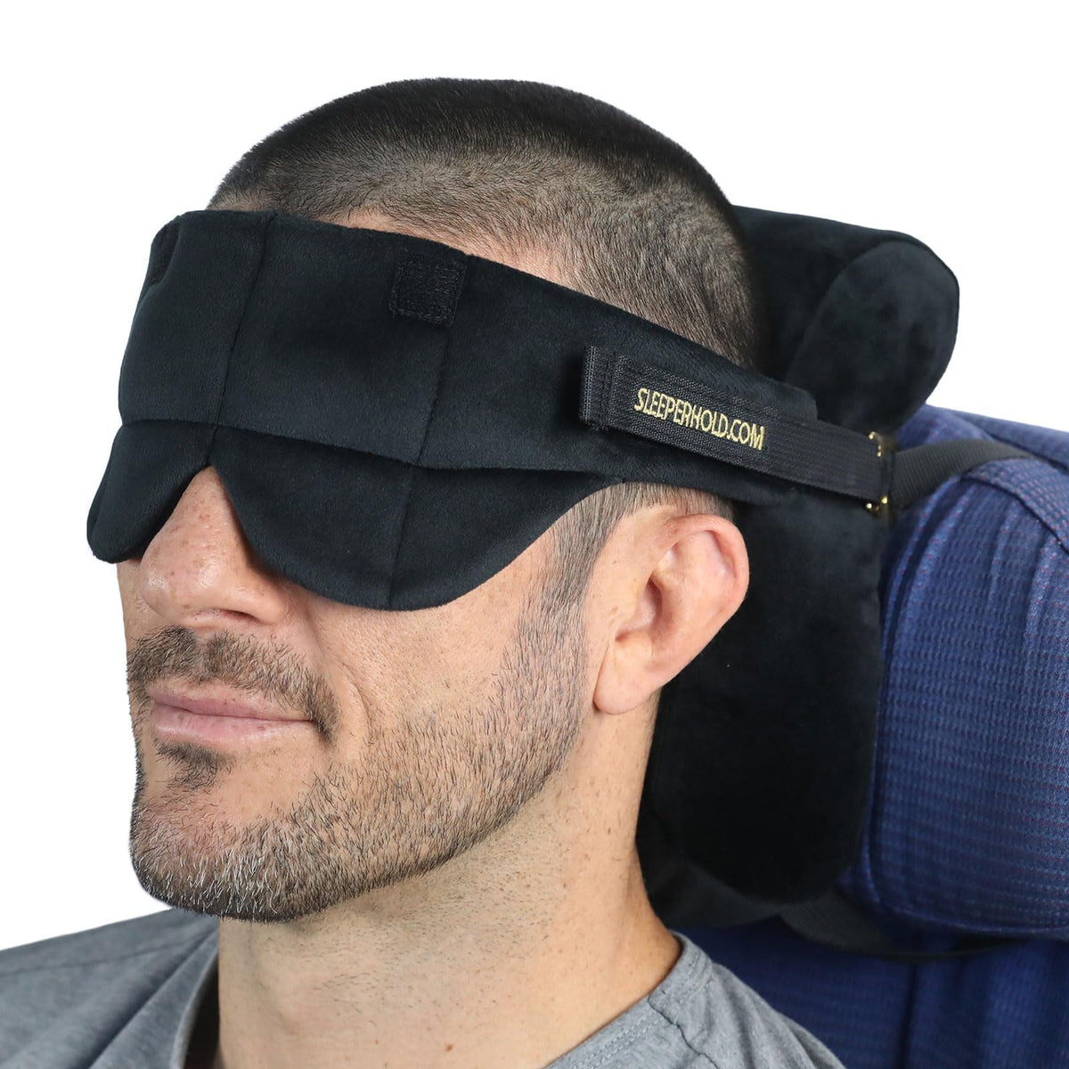 Sleeper Hold seat-back attachment helps steadier sleep on crowded flights.