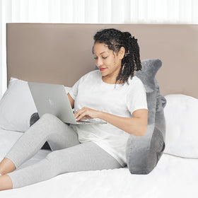 SLIGUY bed rest pillow supports lounging during reading, gaming, or TV.