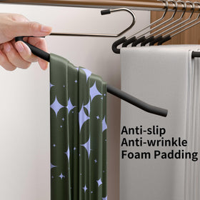 SLMT pants hanger in closet demonstrates easy access design without removing from rod