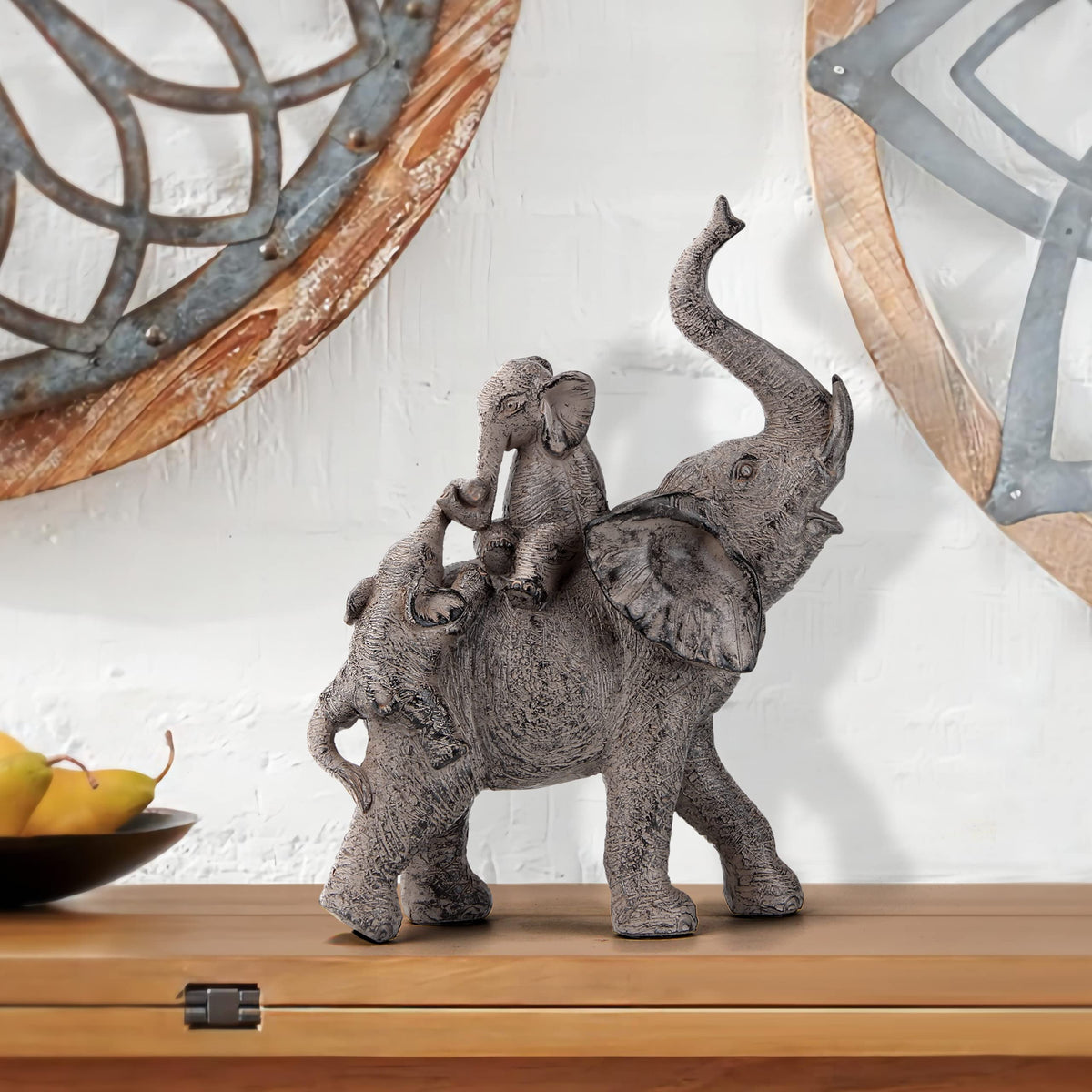 Smadeer trunk-up elephant, close view symbolizing luck and good will.
