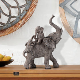 Smadeer trunk-up elephant, close view symbolizing luck and good will.