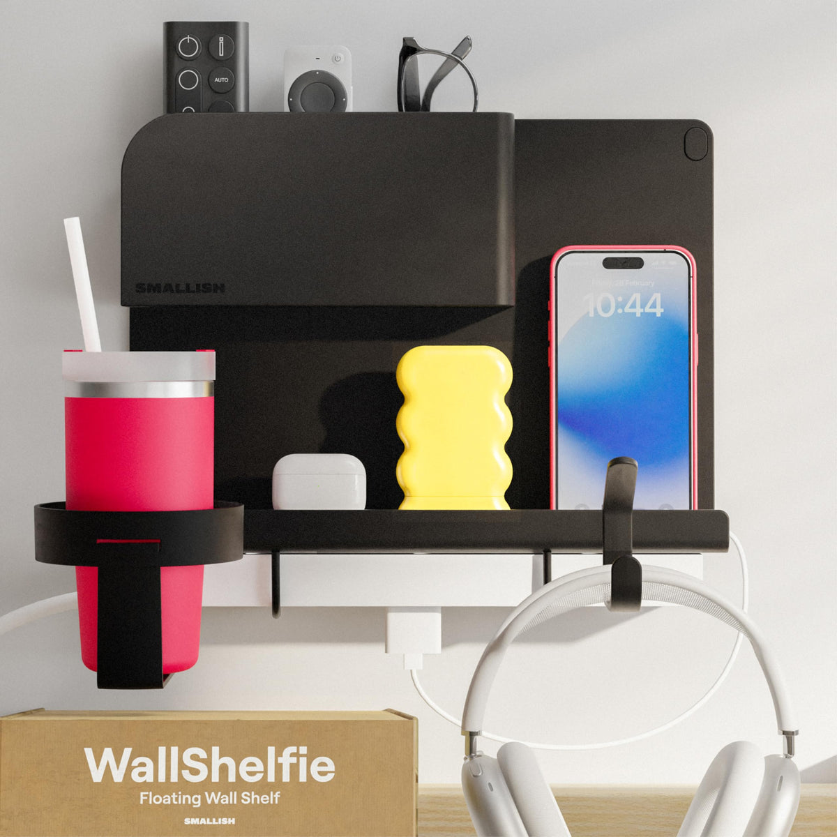 Smallish WallShelfie floating bedside shelf in black for tidy dorm storage and bedside convenience.