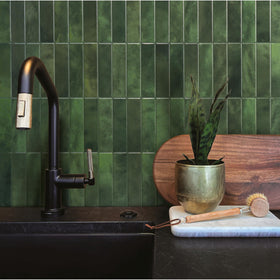 Smart Tiles peel-and-stick 3D tiles showcase durable, water-resistant finish.