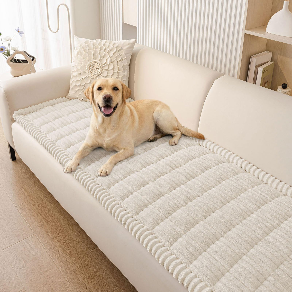 Smiry couch cover on a sofa showing cozy fuzz and protection.