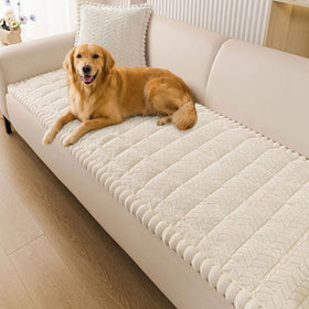 Smiry non-slip beige couch cover with fuzzy fabric protects furniture from pets.