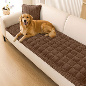 Smiry non-slip fuzzy couch cover on brown sofa, shielding against pet hair.