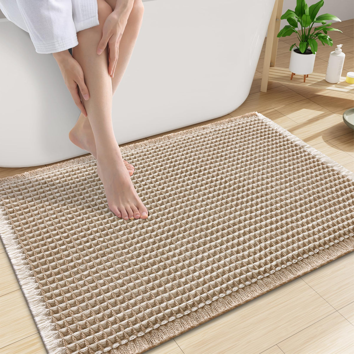 Smiry waffle bath mat 30x20 absorbs water quickly, keeping feet dry.