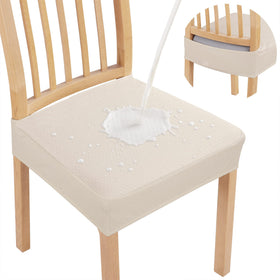 Smiry waterproof chair covers in beige protecting dining chairs from spills.