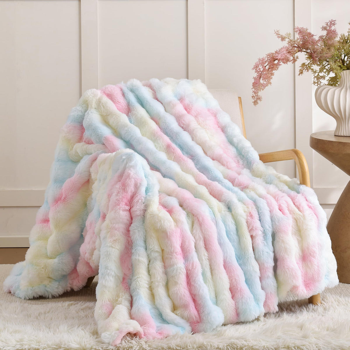 Smoofy rainbow bubble texture blanket on sofa, vibrant and cozy.