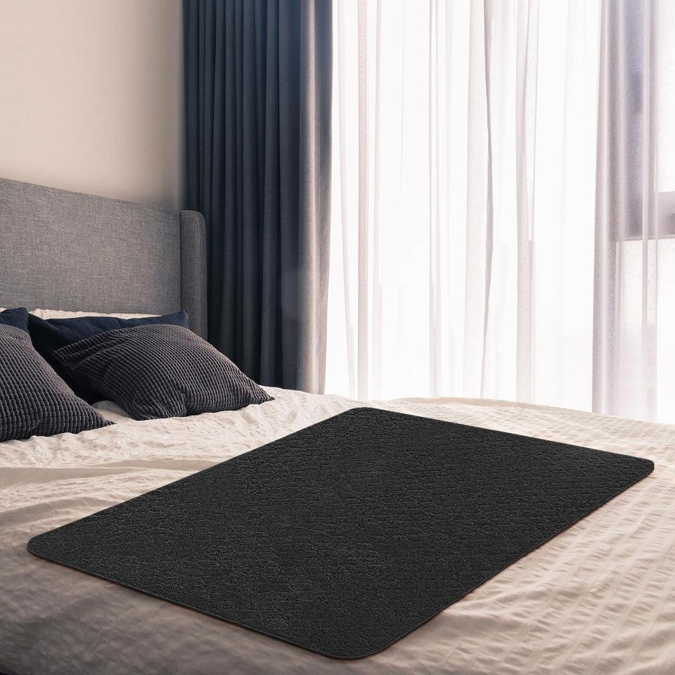 SmoothNovelty mat folded, highlighting its protective barrier for the bed