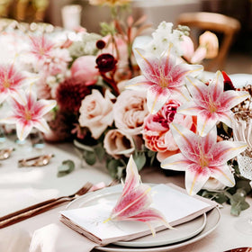 SNAIL GARDEN pink lily heads add soft color to home decorations.