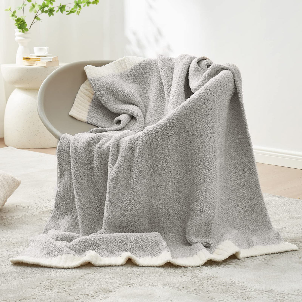 Snuggle Sac Buttery Grey throw on couch highlights lightweight warmth for relaxed evenings