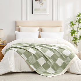 Snuggle Sac cozy nap on sofa demonstrates warmth and comfort.