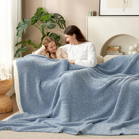 Snuggle Sac decorative blanket enhances living room with cozy charm