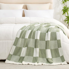 Snuggle Sac folded 50x60 blanket demonstrates compact warmth.