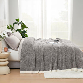 Snuggle Sac gift-ready packaging highlights a thoughtful soft knit blanket.