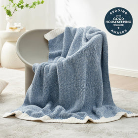 Snuggle Sac Heather Blue throw folded showcases compact storage and simple gifting appeal