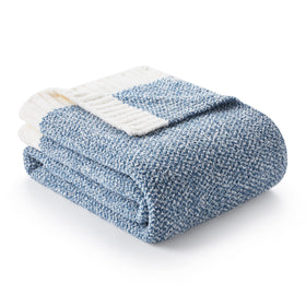 Snuggle Sac Heather Blue throw on sofa provides cozy warmth for relaxing evenings