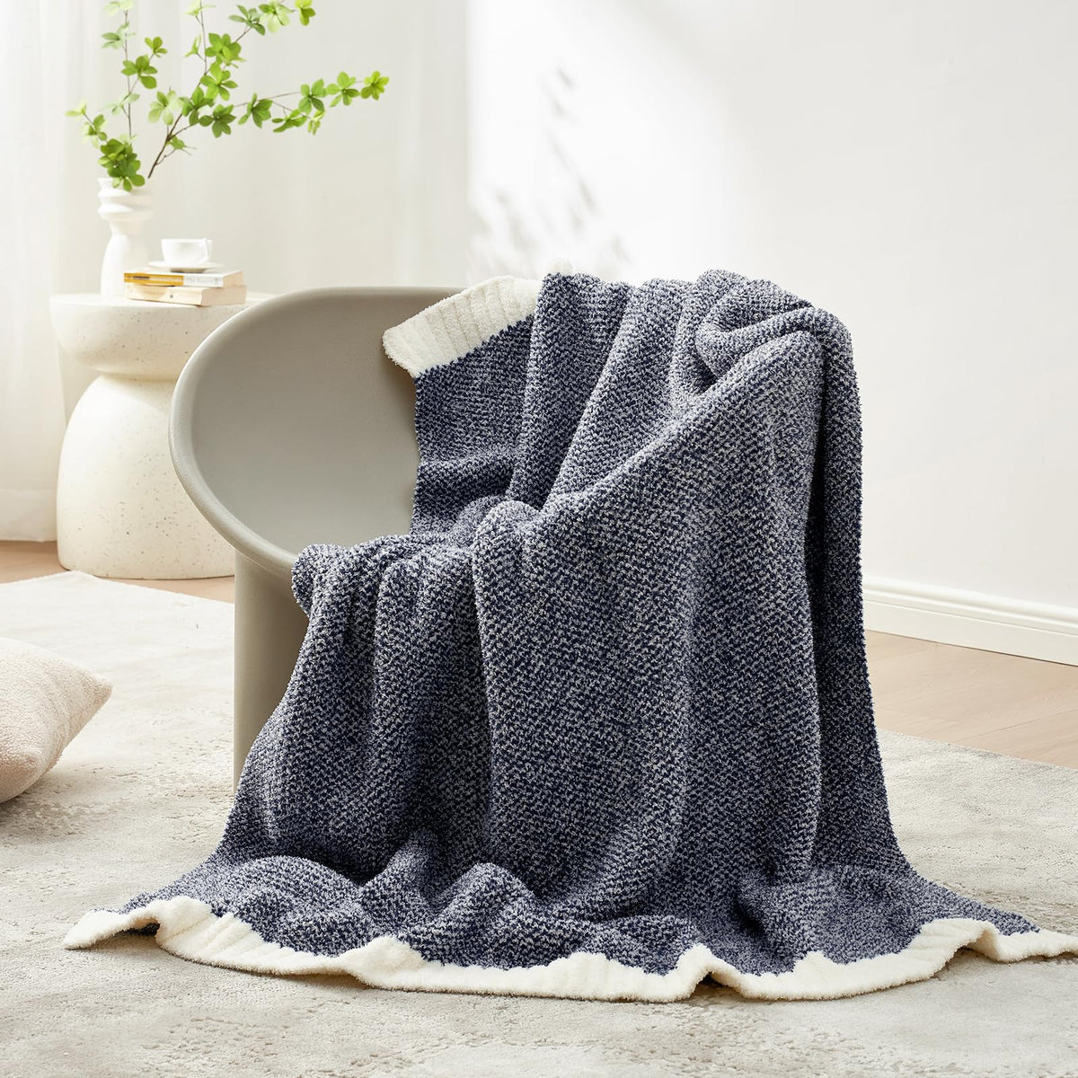 Draped Snuggle Sac blanket adds cozy ambiance to bed and night routines.