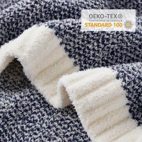Reversible heather knit on Snuggle Sac blanket offers two cozy looks for any room.