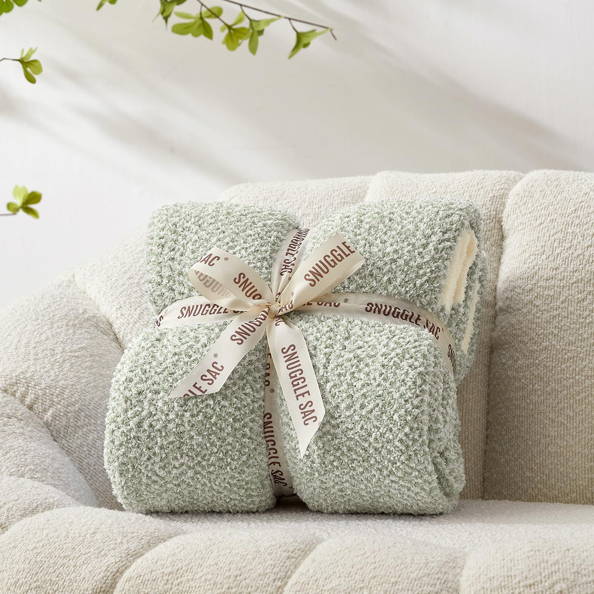 Snuggle Sac Heather Sage Green throw front view showing plush warmth for the living room