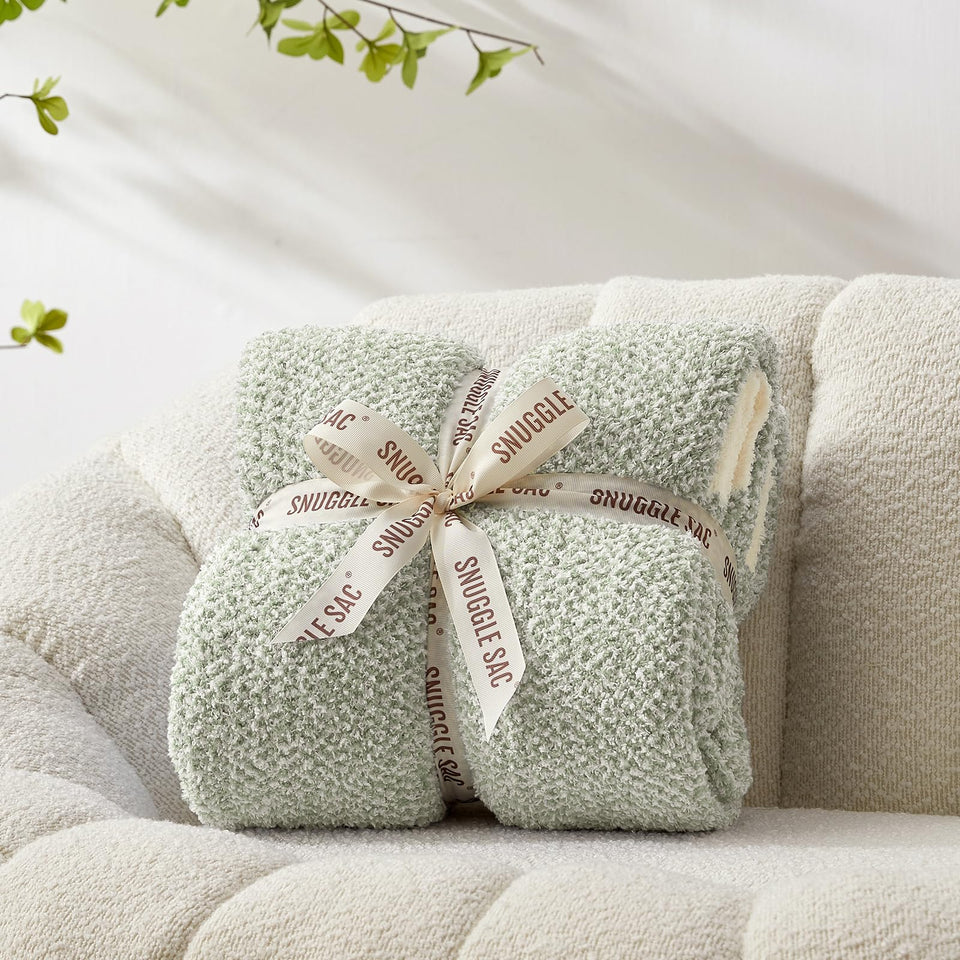 Snuggle Sac Heather Sage Green throw front view showing plush warmth for the living room