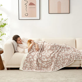 Snuggle Sac leopard throw bed-side adds a plush accent for movie nights