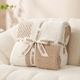 Snuggle Sac plaid pattern close-up highlights vibrant colors for stylish room accents.